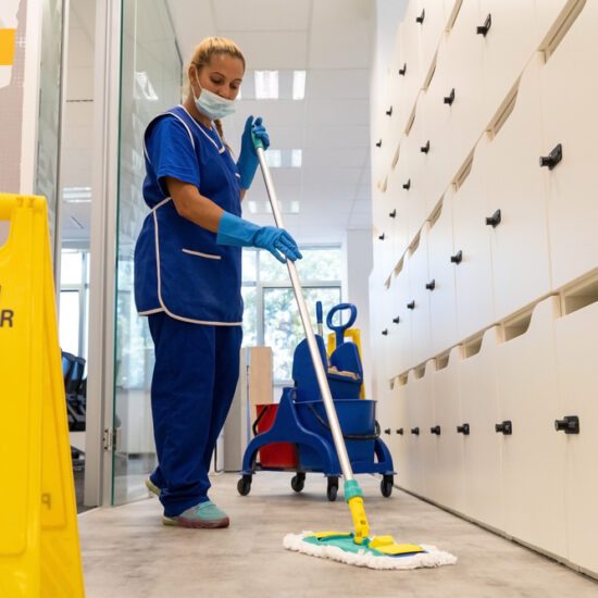 A,Cleaner,With,A,Mask,On,Her,Face,Cleans,The