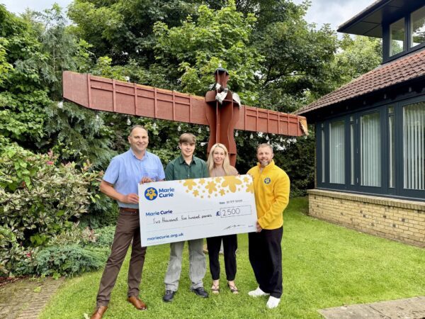 NECS Cleaning Raises £2,500 for Marie Curie