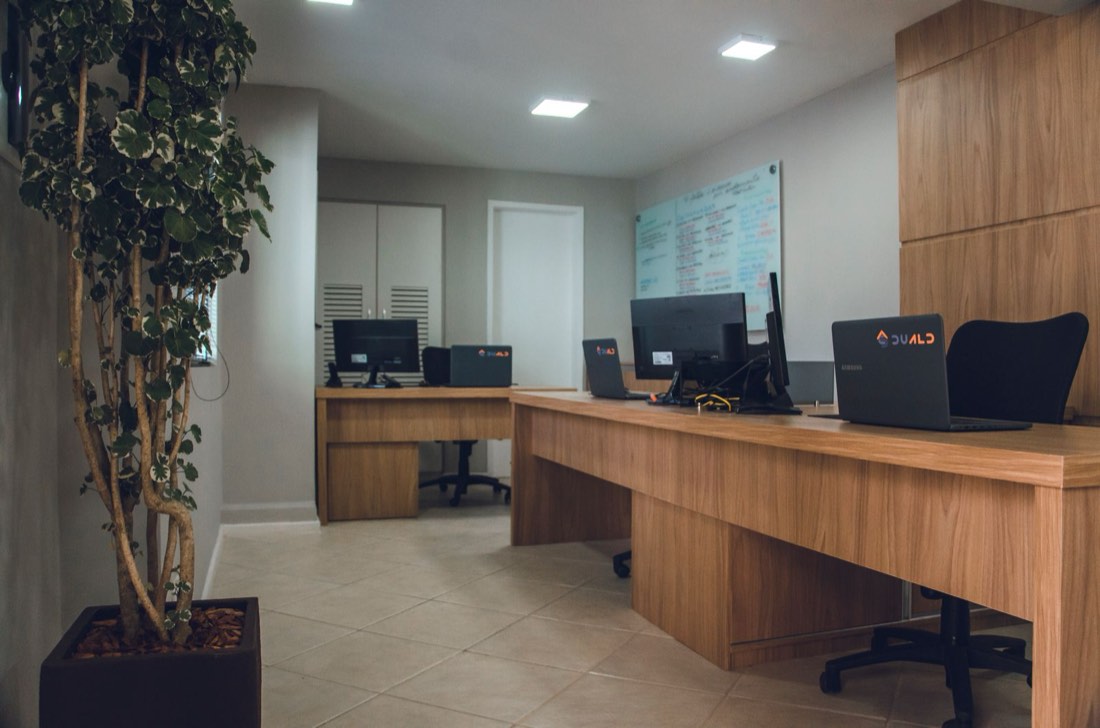 Tidy office workstations with monitors, ready for the working day
